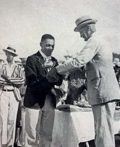 A young Alma Hunt, the hero of the Somerset team in the 1930s, receiving one of his numerous trophies. Hunt broke all records for individual scoring in Cup Matches (Photo from thebermudian.com)
