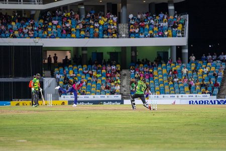 Shamarh Brooks of the Jamaica Tallawahs driving through the offside during his top score of 78 against the Barbados Royals in the CPL