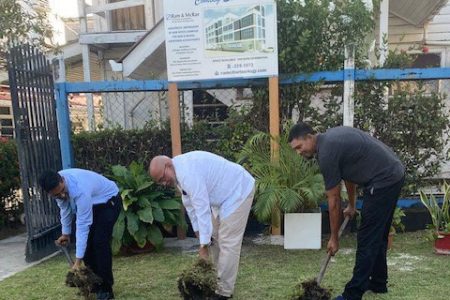 From L to R: Christoff Ram, former President Donald Ramotar and contractor Andy Playter taking part in the sod-turning exercise.