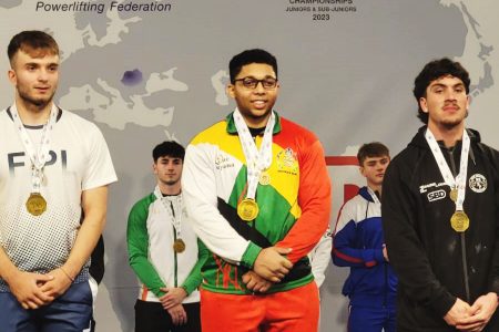 Guyana’s Romeo Hunter (centre), Italy’s Di Felice Fabrizio, and New Zealand’s Thomas Scanlon after receiving their squat medals.   Caption Guyana’s Romeo Hunter (middle), Italy’s Di Felice Fabrizio, and New Zealand’s Thomas Scanlon after receiving their squat medals