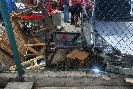 The damaged stall and vehicle involved in the accident
