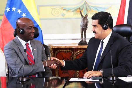 Prime Minister of Trinidad and Tobago Keith C Rowley (left) and Venezuelan President Nicolas Maduro (right)