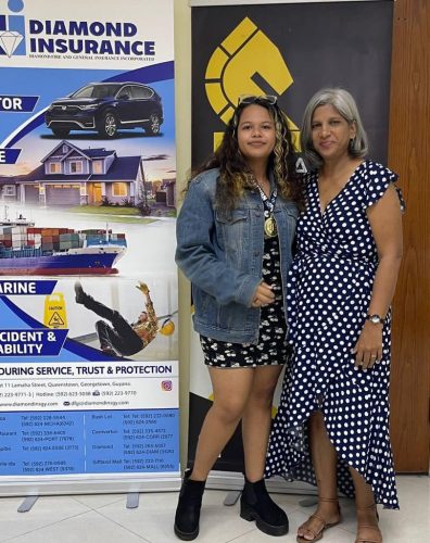 Sasha Shariff (left), winner of the Diamond Fire and General Insurance 2023 Women’s Qualifiers Chess Tournament poses with Secretary of the Guyana Chess Federation Marcia Lee 