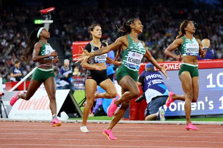 Sha'Carri Richardson (centre) crossing the line to win the Women's 100M at the Zurich Diamond League event.