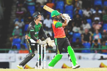 Shai Hope unleashes a powerful shot into the stands during his top score of 54 against the St. Kitts and Nevis Patriots in the CPL.