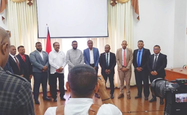 Some of the newly-elected mayors in a group photo with President Irfaan Ali (fifth from left) 