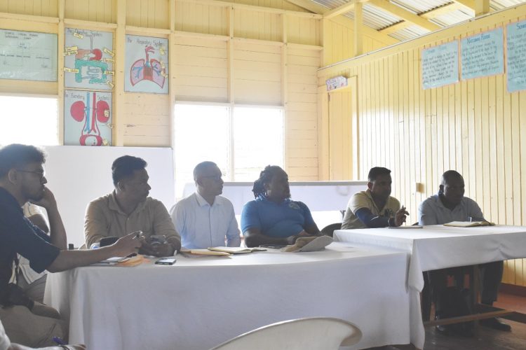 The government team. Alister Charlie is third from left