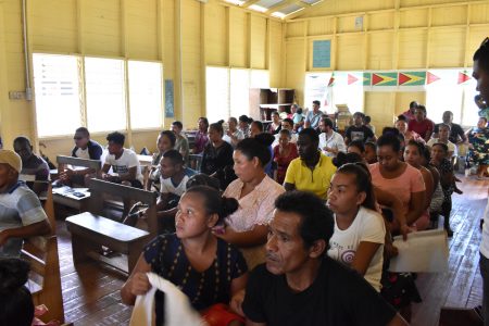 Villagers at the fact-finding meeting