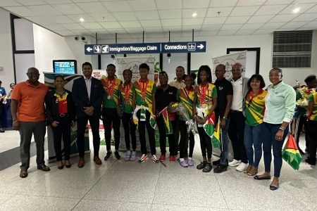 The Youth Commonwealth Games contingent which represented Guyana in Trinidad and Tobago returned to a patriotic welcome yesterday at the Cheddi Jagan International Airport. (Emmerson Campbell photo)