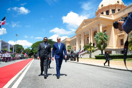 President Irfaan Ali (left) and Dominican Republic President Luis Abinader outside of the presidential palace in Santo Domingo yesterday.
(Office of the President photo)