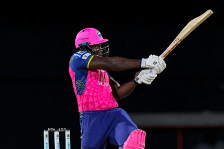 Barbados Royals captain Rovman Powell goes on the attack during his unbeaten 67 on Saturday night. (Photo courtesy CPLT20/Getty Images)
