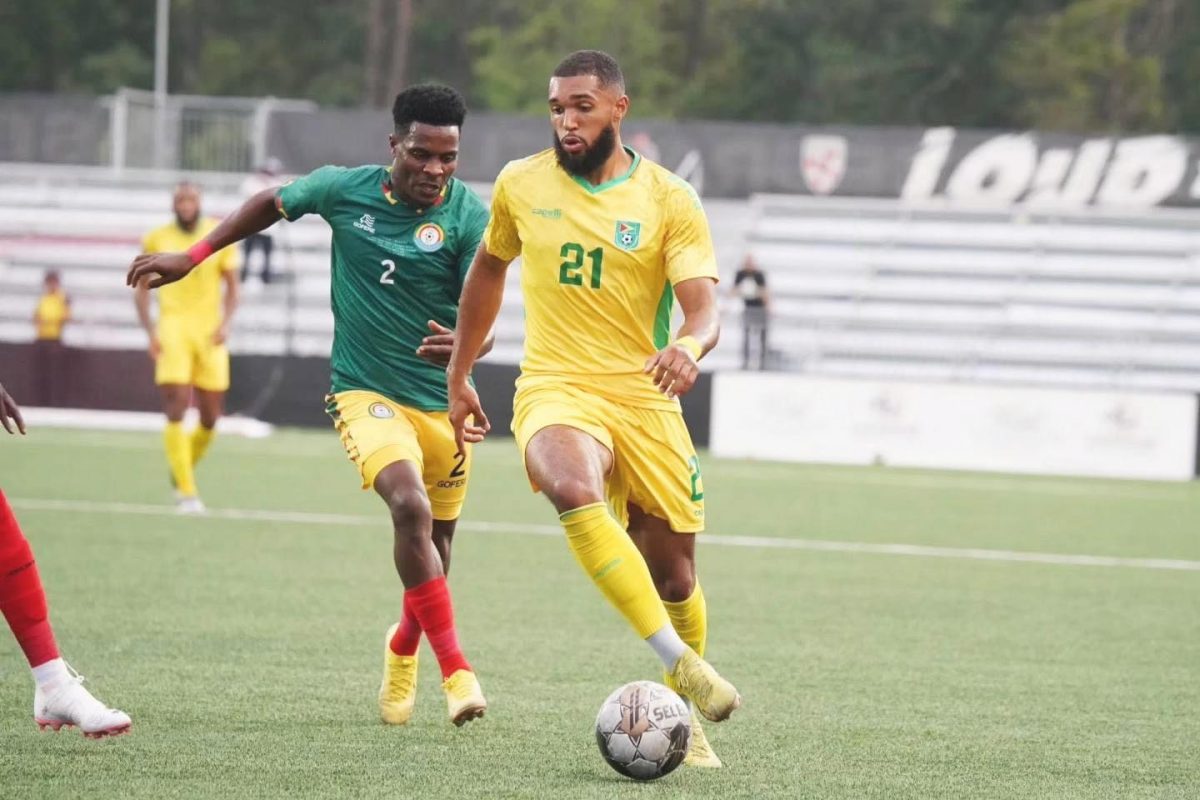 Deon Moore (right) of Guyana on the attack while being pursued by an Ethiopian player during their international friendly at the Segra Field in Leesburg, Virginia, United States of America.