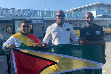 OFF TO THE WORLDS! Romeo Hunter, left and Dominic Tyrell with Guyana Amateur Powerlifting Federation (GAPLF) president Frankie Wilson