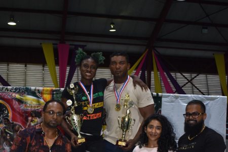  The overall best male and female lifters showcase their silverware in the presence of the sponsors.   