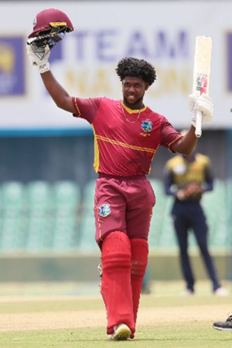 Jordan Johnson celebrates his brilliant hundred in the second Youth One-Day International against Sri Lanka Under-19s yesterday. (Photo courtesy CWI Media) 