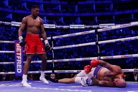 Anthony Joshua knocks down Robert Helenius.
Action Images via Reuters/Andrew Couldridge