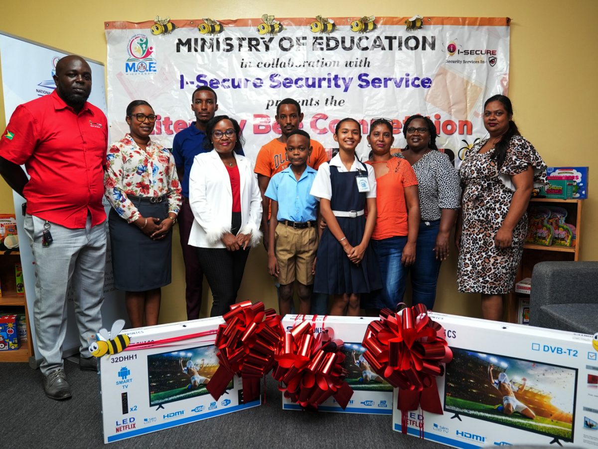 The Ketley Primary School won the Ministry of Education’s Literacy Bee Competition. The Deputy Headteacher,  Alexis Alleyne-Carter, and students Antwon Henry and Angelina Deonarine received the prizes on behalf of the school on Thursday at the National Literacy Department (NLD). The two students represented Ketley Primary in the competition.  (Ministry of Education photo)
