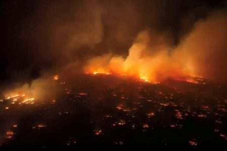 An aerial view of a wildfire in Kihei, Maui County, Hawaii, U.S., August 8, 2023 in this screen grab obtained from a social media video.   Clint Hansen of Maui Real Estate Radio/TMX via REUTERS