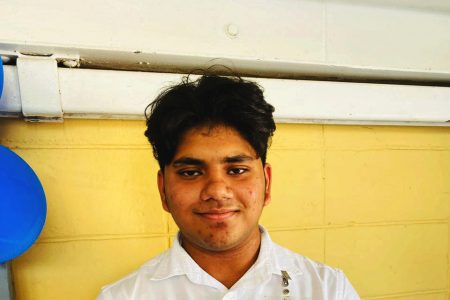 Alex Muntaz, preliminarily top CSEC student from Anna Regina Secondary School with 27 subjects (Ministry of Education photo)