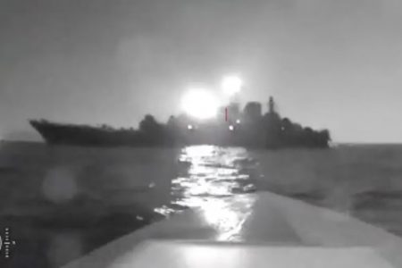 A sea drone shows the silhouette of Olenegorsky Gornyak ship near the port of Novorossiysk, Russia, in this screengrab obtained from social media video released on August 4, 2023.VIDEO OBTAINED BY REUTERS/Reuters