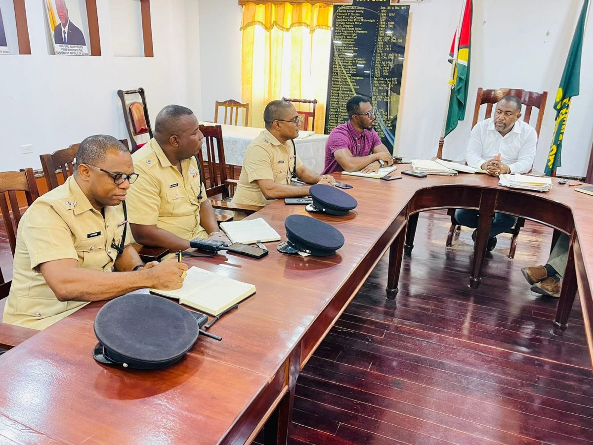 Senior Superintendent Shivpersaud Bacchus (third from left) at the New Amsterdam meeting (Police photo)