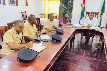 Senior Superintendent Shivpersaud Bacchus (third from left) at the New Amsterdam meeting (Police photo)