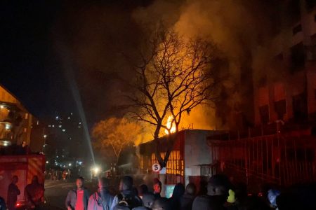 Flames rise from a building amid a deadly fire, in Johannesburg, South Africa, August 31, 2023, in this still image obtained from a social media video. X/@odirileram/via REUTERS