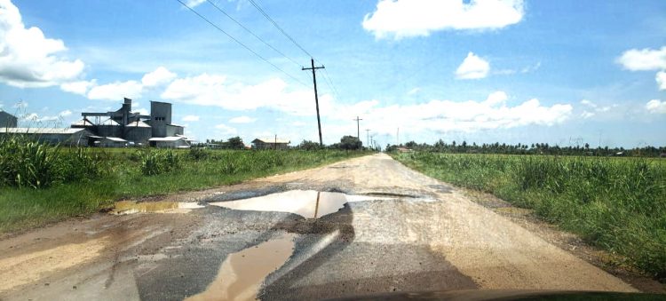 This pothole stretches across the road