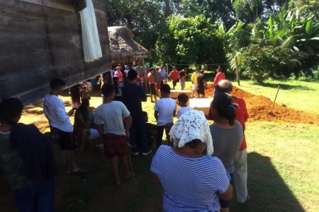 The three children being buried (Police photo)