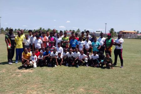 Participants of the West Berbice and Upper
Corentyne clinics pose with the coaches and BCB officials.
