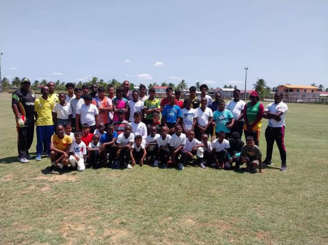 Participants of the West Berbice and Upper
Corentyne clinics pose with the coaches and BCB officials.
