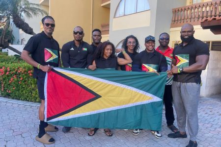 Members of the Guyana team that arrived in Aruba to compete at the CAC Games from left: Rawle Green, Emmerson Campbell, Nicholas Albert, Hannah Rampersaud, Christina Ramsammy, Darious Ramsammy, [manager] Keavon Bess, and Julio Sinclair