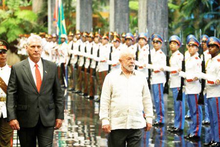 Cuba's President Miguel Diaz-Canel (left) and Brazil's President Luiz Inacio Lula da Silva review an honour guard at the Revolution Palace during the G77+China summit in Havana, Cuba, September 16, 2023. REUTERS/Alexandre Meneghini 