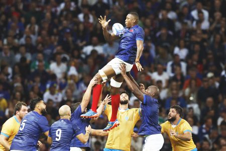 Cameron Woki of France
(mid-air) about to receive a pass during a line out segment against Uruguay in Pool A of the Rugby World Cup
