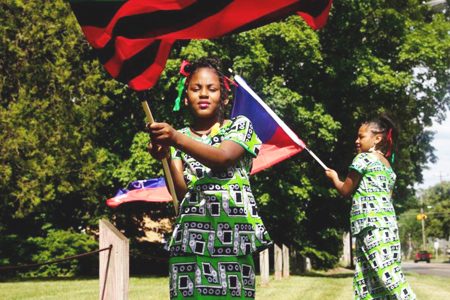 People celebrate Juneteenth, which commemorates the end of slavery in Texas, two years after the 1863 Emancipation Proclamation freed slaves elsewhere in the United States, in Flint, Michigan, U.S., June 19, 2021. REUTERS/Emily Elconin