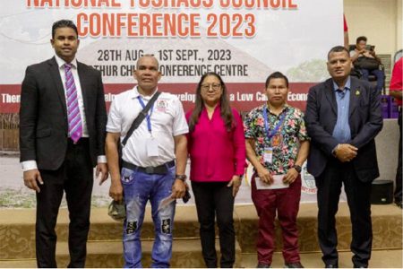 Minister of Culture, Youth and Sport, Charles Ramson Jr (left), Minister of Amerindian Affairs, Pauline Sukhai (centre) and Minister of Housing and Water, Collin Croal (right) with some of the beneficiaries. (DPI photo)
