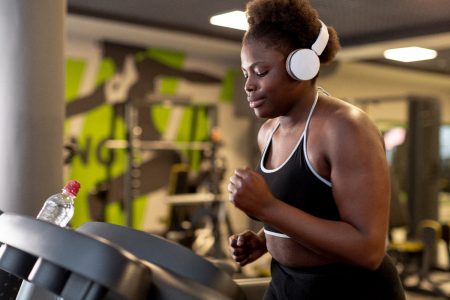  You can pop on your headphones to keep distractions at bay in the gym (Image by Freepik)
