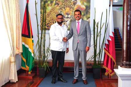 Sheikh Tamim Bin Hamad Al Thani (right) with President Irfaan Ali yesterday at State House. (Office of the President photo)
