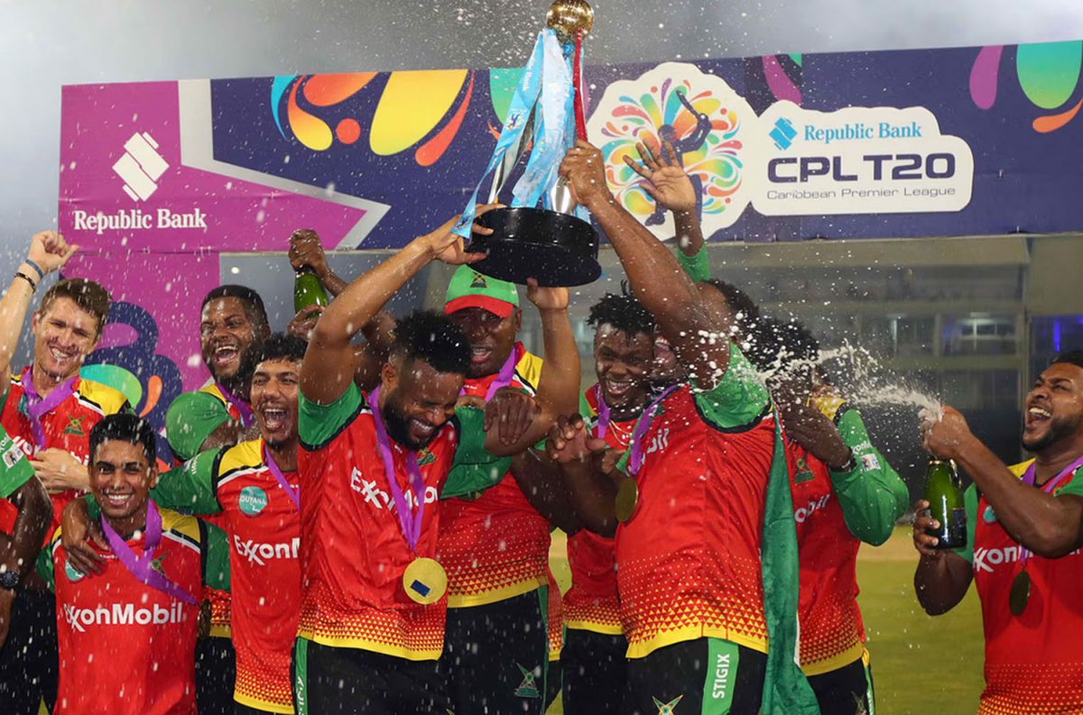 The Guyana Amazon Warriors celebrate their victory on Sunday night.