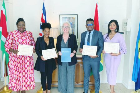 From right are Amrita Narine, Joshua Benn, British High Commissioner to Guyana Jane Miller, Keisha Edwards and Deanna Walcott. (British High Commission photo)