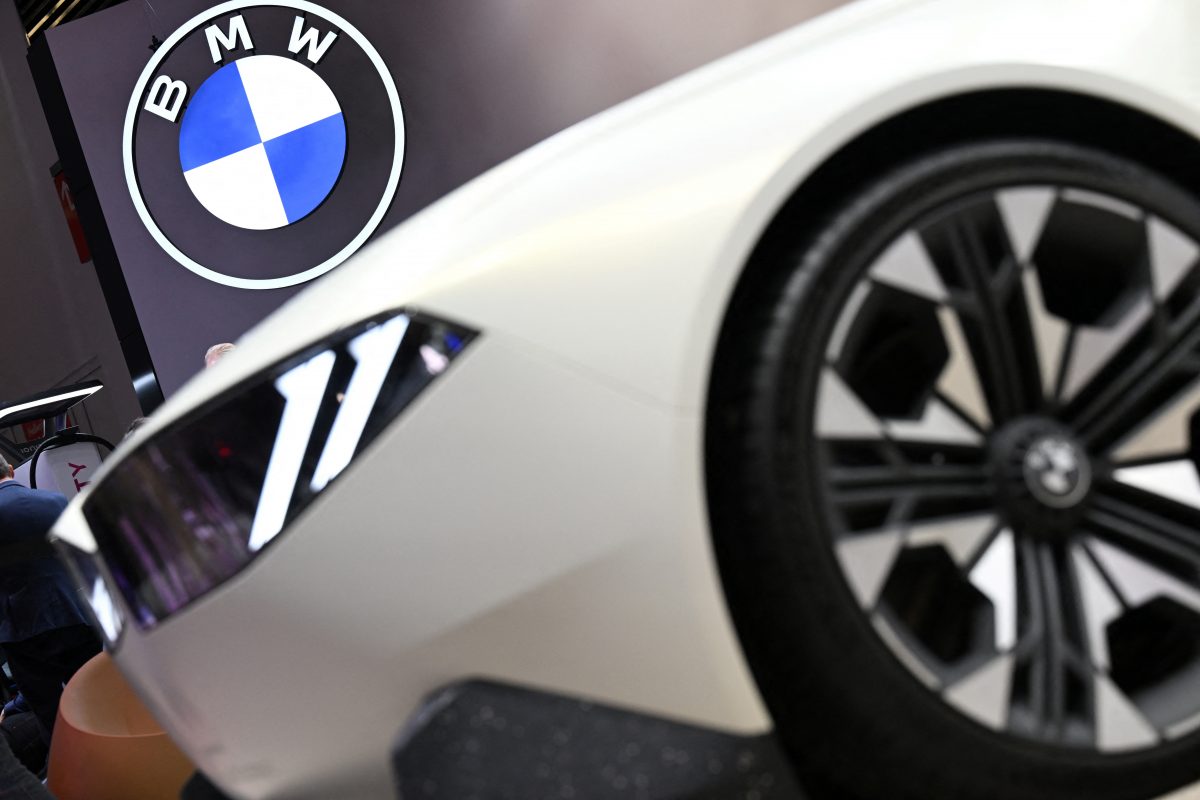 FILE PHOTO: A BMW Vision Neue Klasse is displayed next to the company’s logo during an event a day ahead of the official opening of the 2023 Munich Auto Show IAA Mobility, in Munich, Germany, September 4, 2023. REUTERS/Angelika Warmuth/File Photo