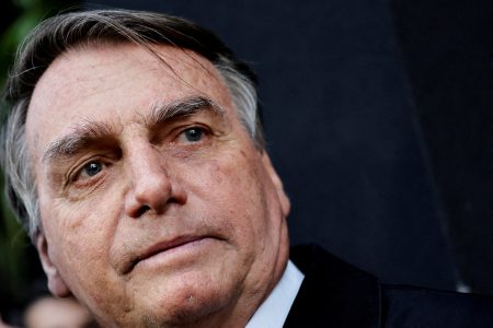 FILE PHOTO: Former Brazilian President Jair Bolsonaro looks on before a session in the Legislative Assembly of Goias to receive the title of citizen of Goias, in Goiania, Brazil August 18, 2023. REUTERS/Ueslei Marcelino/File Photo