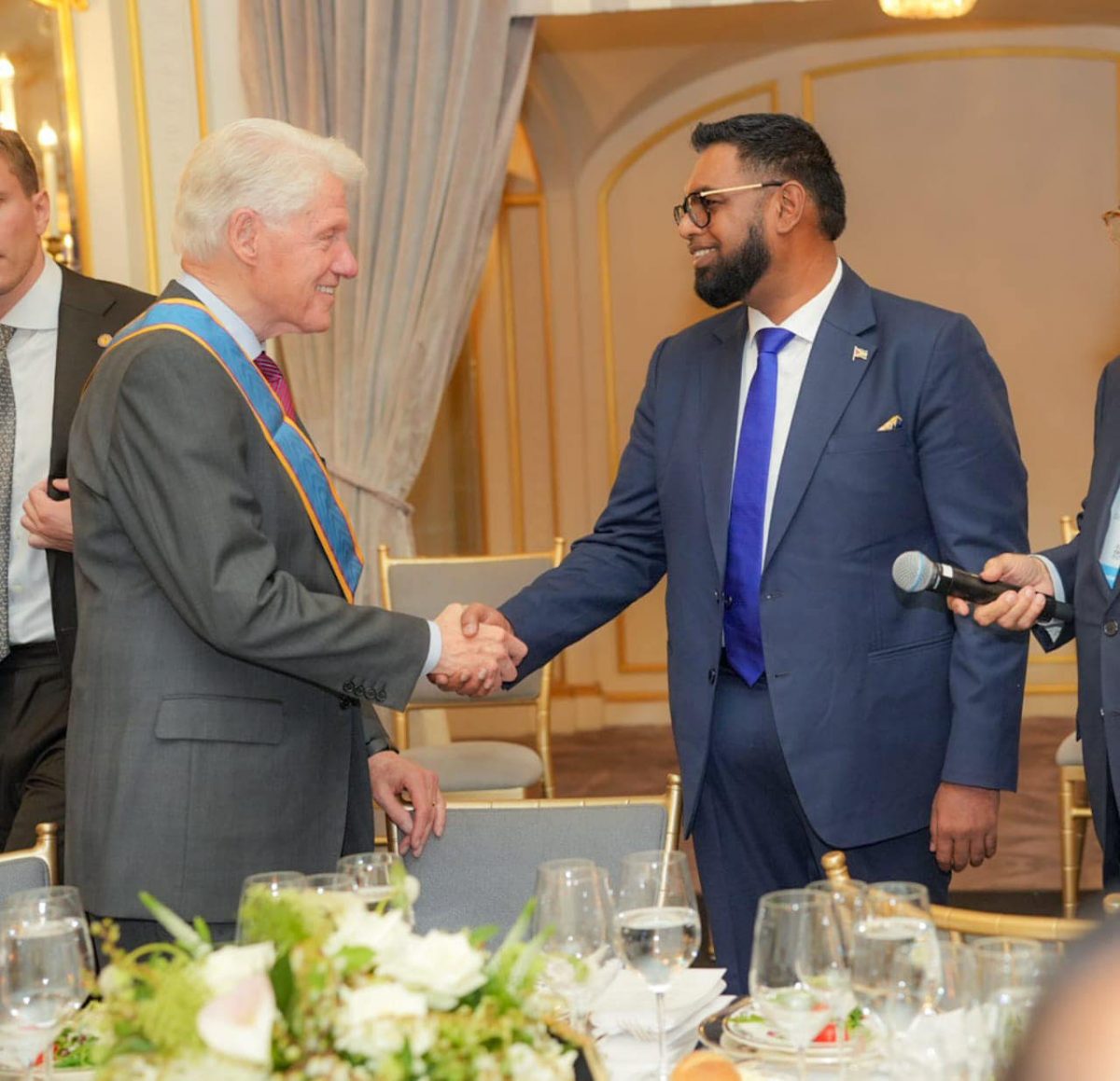 President Irfaan Ali attended a private reception last evening hosted by former United States President Bill Clinton, his wife, former Secretary of State Hillary Clinton, and their daughter Chelsea. A release from the Office of the President said that the  reception was attended by current and former Heads of State who are in New York for the United Nations General Assembly and a select group of Fortune 500 CEOs among others. On Tuesday, President Ali will address the 2023 meeting of the Clinton Global Initiative (CGI) in New York, the release said. In this Office of the President photo, President Irfaan Ali (right) greets former US President Bill Clinton.
