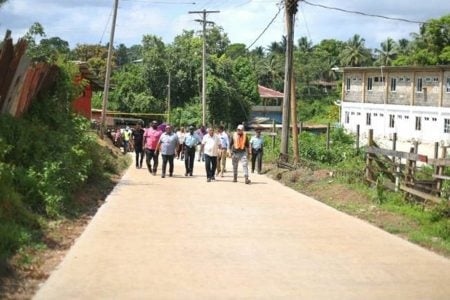 Minister of Housing and Water, Collin Croal and Regional Chairman, Brentnol Ashley during the commissioning of the road (DPI photo)
