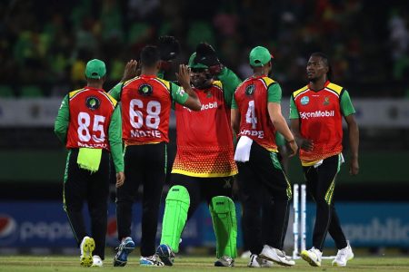 Guyana Amazon Warriors celebrate a wicket