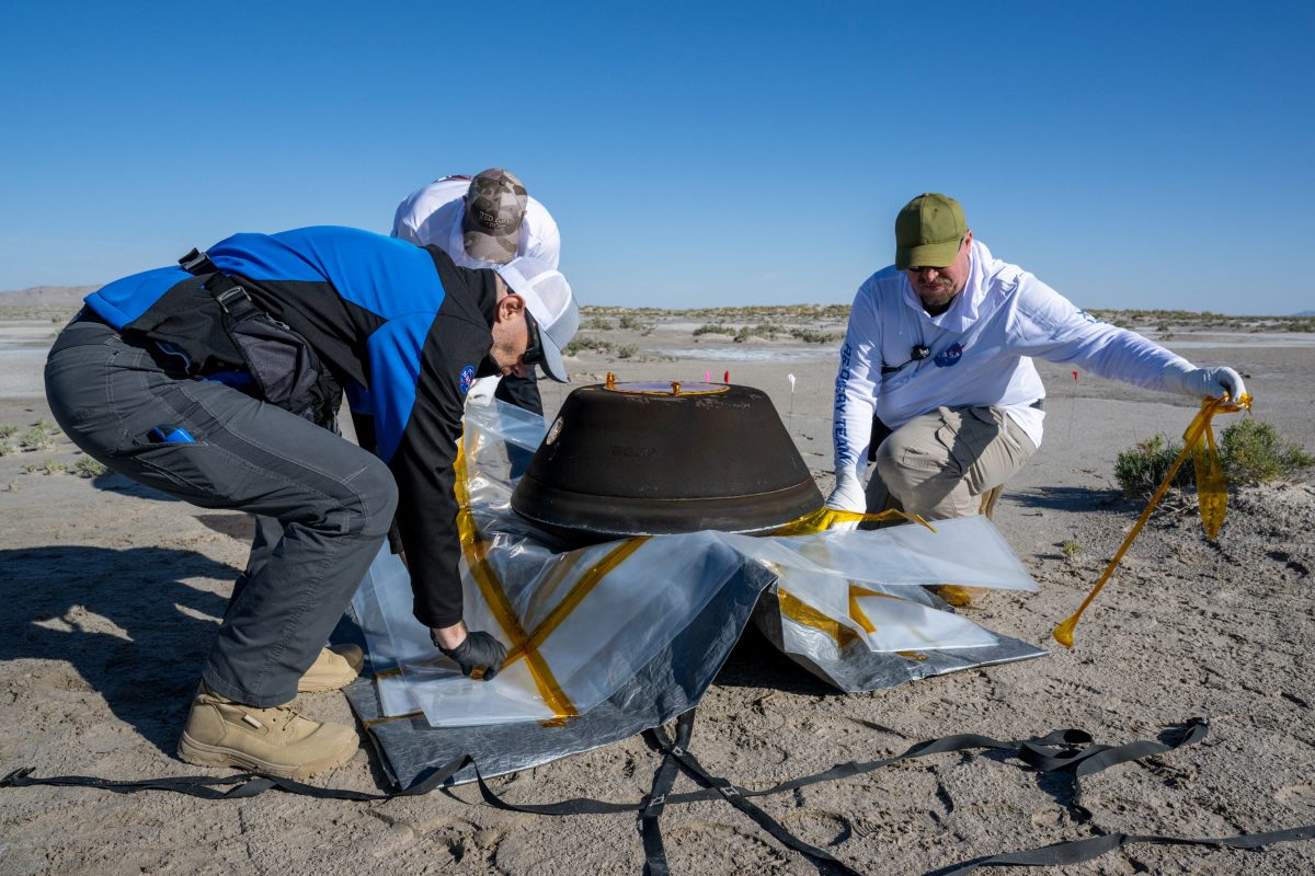 The return capsule containing a sample collected from the asteroid Bennu in October 2020 by NASA’s OSIRIS-REx spacecraft is seen shortly after touching down in the desert at the Department of Defense's Utah Test and Training Range in Dugway, Utah, U.S. September 24, 2023.  NASA/Keegan Barber/Handout via REUTERS
