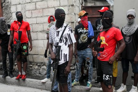 Former police officer Jimmy "Barbecue" Cherizier (not pictured), leader of the 'G9' coalition, is accompanied by Security during a march against Haiti's Prime Minister Ariel Henry, in Port-au-Prince, Haiti September 19, 2023. REUTERS/Ralph Tedy Erol/File Photo