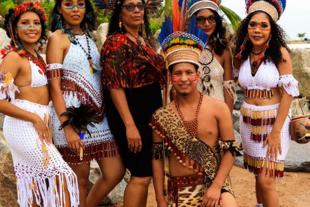 Costumed Amerindians with Natasha standing at centre