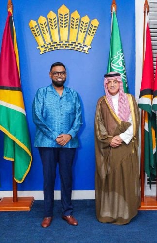 President Irfaan Ali (left) with Saudi Arabia’s Minister of State for Foreign Affairs and Climate Envoy, Adel Ahmed al-Jubeir  (Office of the President photo)