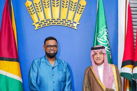 President Irfaan Ali (left) with Saudi Arabia’s Minister of State for Foreign Affairs and Climate Envoy, Adel Ahmed al-Jubeir  (Office of the President photo)